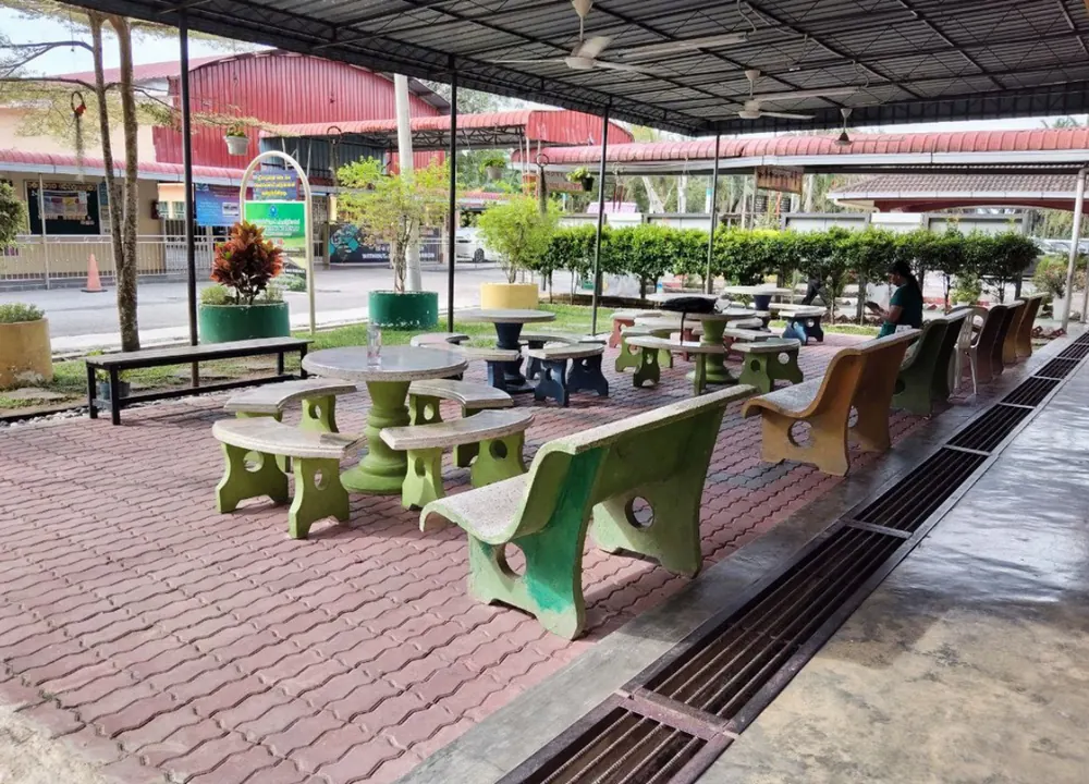 Shaded seating at the Anjung Ilmu outdoor learning corner